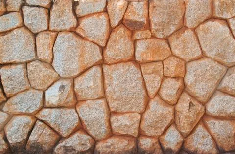 Background of stone wall texture Stock Photos