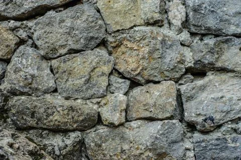 Background of stone wall texture Stock Photos