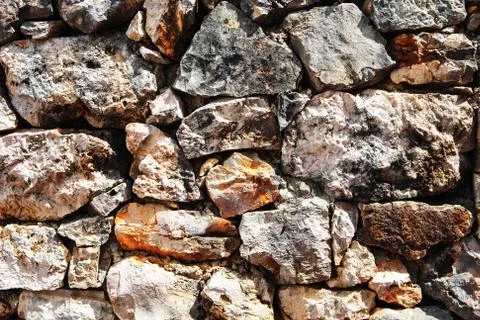 Background of stone wall texture Stock Photos