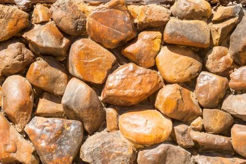 Background of stone wall texture Stock Photos
