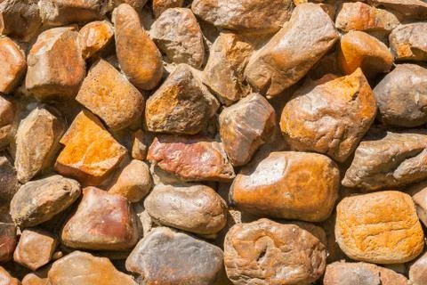 Background of stone wall texture Stock Photos