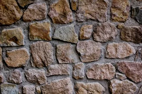 Background of stone wall texture Stock Photos