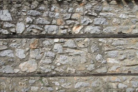 Background of stone wall texture Stock Photos