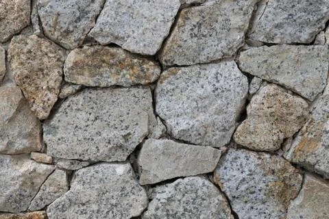 Background of stone wall texture Stock Photos