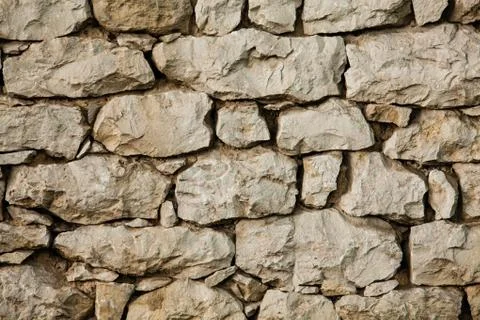 Background of stone wall texture Stock Photos