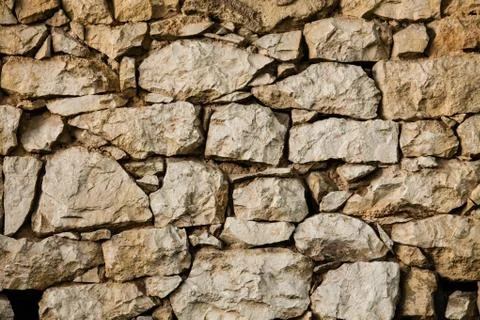 Background of stone wall texture Stock Photos
