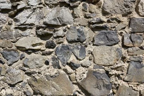 Background of stone wall texture Stock Photos