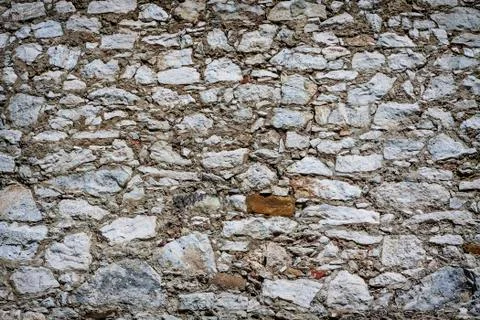 Background of stone wall texture Stock Photos