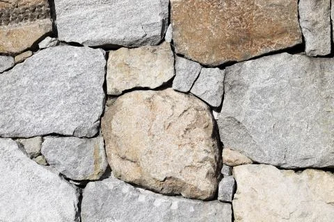 Background of stone wall texture Stock Photos