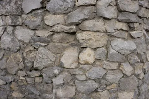 Background of stone wall texture . Stock Photos