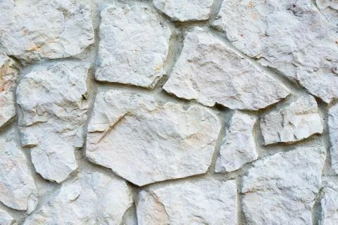 Background of stone wall texture Stock Photos