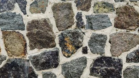 Background of stone wall texture Stock Photos