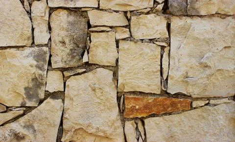 Background of stone wall texture Stock Photos