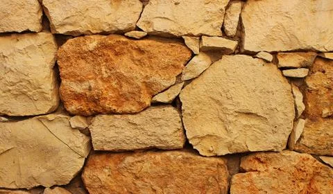 Background of stone wall texture Stock Photos