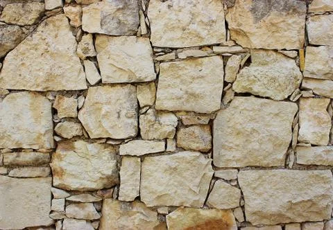Background of stone wall texture Stock Photos
