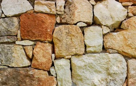 Background of stone wall texture Stock Photos