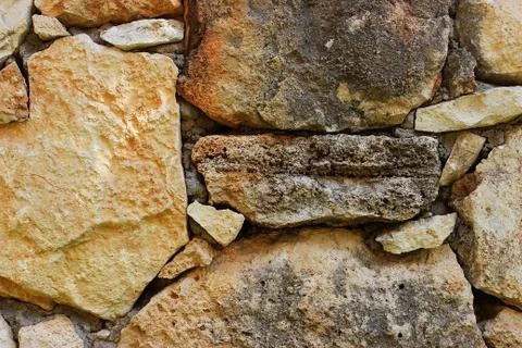 Background of stone wall texture Stock Photos