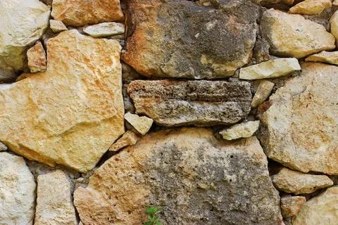 Background of stone wall texture Stock Photos