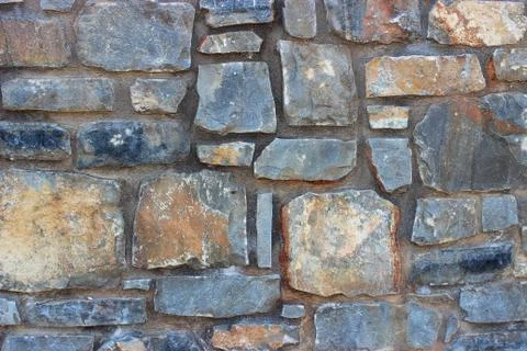 Background of stone wall texture Stock Photos