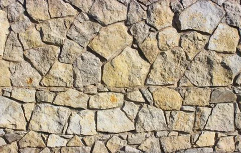 Background of stone wall texture Stock Photos