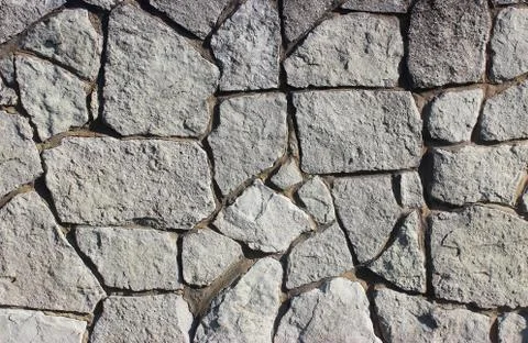 Background of stone wall texture Stock Photos