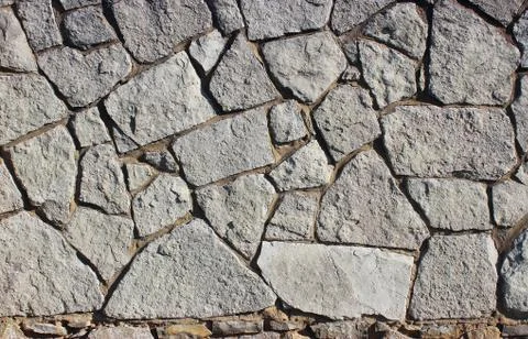 Background of stone wall texture Stock Photos