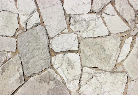 Background of stone wall texture Stock Photos