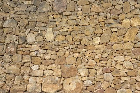 Background of stone wall texture. Fotos Stock