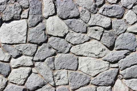 Background of stone wall texture Stock Photos