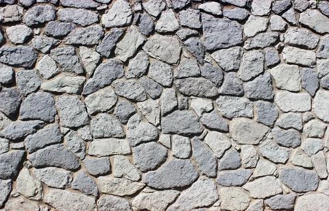 Background of stone wall texture Stock Photos