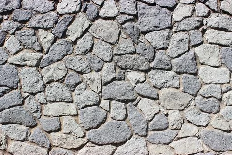 Background of stone wall texture Stock Photos