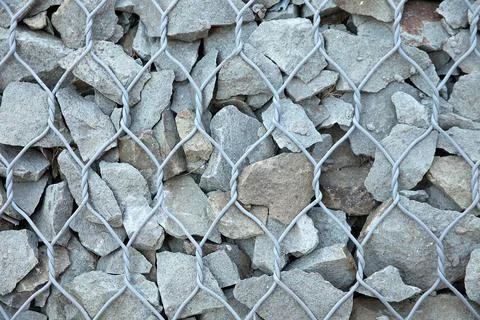 Background of stones, fixed wire Stock Photos