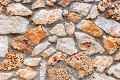Background of stony wall with cement Stock Photos