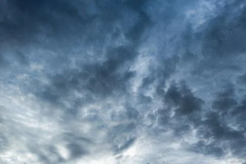 Background of storm clouds before a thunder-storm Stock Photos