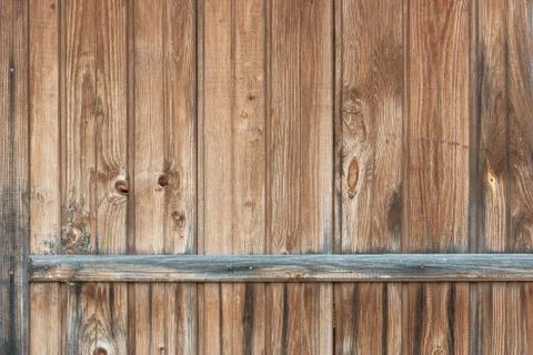 Background in style a rustic from old vertical wooden unpainted boards Stock Photos