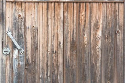 Background in style a rustic from old vertical wooden unpainted boards with the Stock Photos