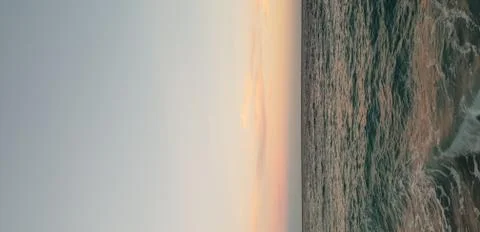 Background with sunset on the sea Stock Photos
