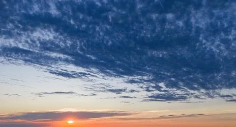 Background with sunset sky. Background under dark clouds. Dramatic background Stock Photos