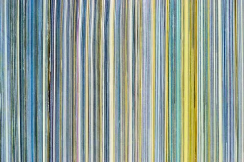 Background surface of colorful magazines stack side view Stock Photos