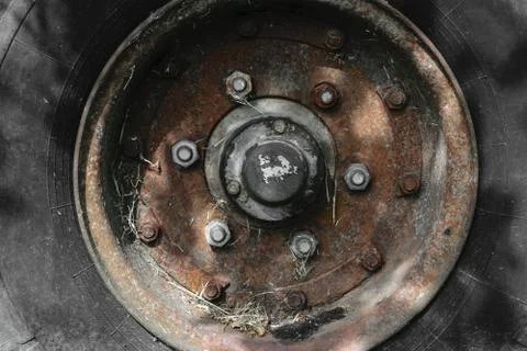 Background Surface of Old and Dirty Tire with Rusty Disc Stock Photos