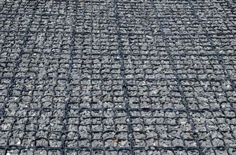 Background from surface of the plastic framework and stones Stock Photos