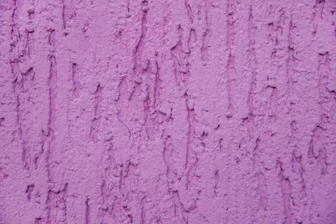 Background surface with the texture of pink plaster. Old cement horizontal wa Stock Photos