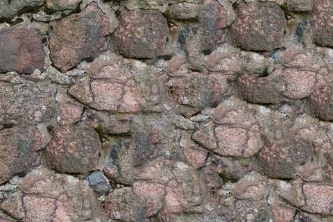 Background surface of uneven stone cobblestone red brown texture pattern Stock Photos