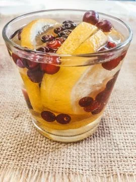 A background on the table refreshing cocktail of berries 写真素材