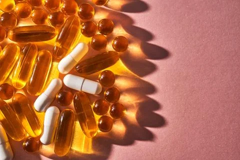 Background of tablets. Mainly vitamins and dietary supplements. Stock Photos