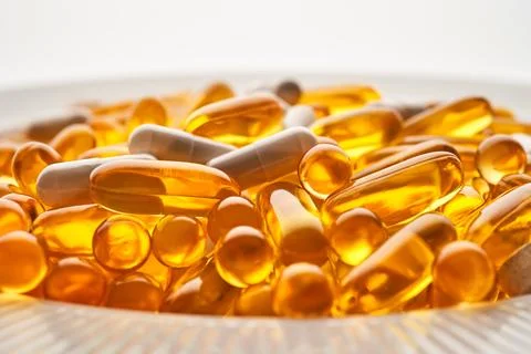 Background of tablets. Mainly vitamins and dietary supplements. Stock Photos