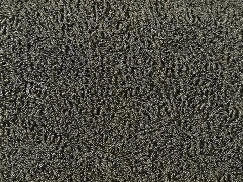 Background of tangled and compressed thin steel wire. Foto stock