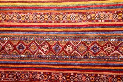 Background textile vibrant pattern featuring colorful stripes and geometric.. Stock Illustration