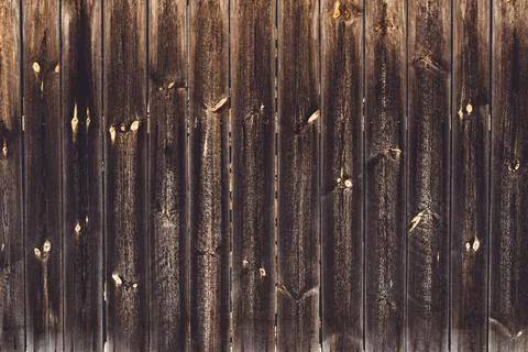 Background texture. Aged brown plank surface with nails. Copy space Stock Photos