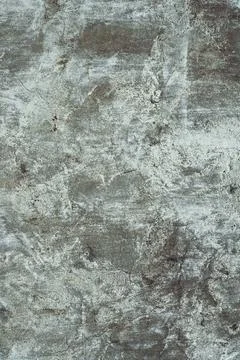 Background texture. Aged concrete surface with white paint residues. Top view Stock Photos